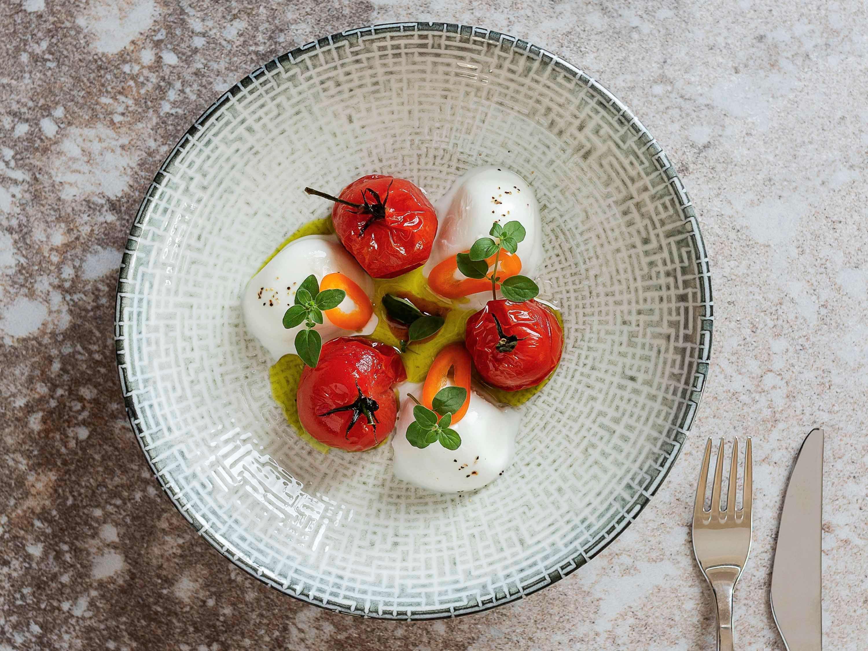 Pullman Rotorua Exterior foto A salad of mozzarella, tomatoes and peppers